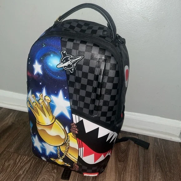 Sprayground Black and Blue Cosmic Backpack - Picture 1 of 4